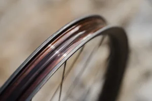 Cadex Max XC hookless carbon rim Close up of the Cadex Max XC hookless carbon rim showing its wide reinforced rim edges.