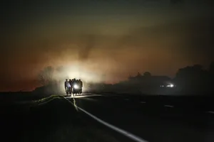 Ride free – 03 Group of road cyclist riding at night