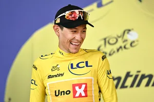 CYCLING-TDF-2026-STAGE 4 Uno-X Mobility team's Norwegian rider Torstein Træen celebrates on the podium with the overall leader's yellow jersey after the 4th stage of the 113th edition of the Tour de France cycling race, 182 km between Carcassonne and Foix in southwestern France, on July 7, 2026. (Photo by Jeff PACHOUD / AFP via Getty Images)