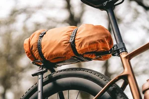 Luggage strapped to a Tailfin Journey Rack Luggage strapped to a Tailfin Journey Rack