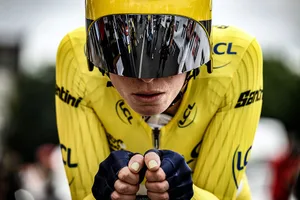 TOPSHOT-CYCLING-FRA-TDF2023-WOMEN-STAGE8 TOPSHOT - Team SD Worx's Dutch rider Demi Vollering wearing the overall leader's yellow jersey reacts before taking the start of the eighth and final stage (out of 8) of the second edition of the Women's Tour de France cycling race a 22,6 km individual time trial between Pau and Pau, south-western France, on July 30, 2023. Dutch rider Demi Vollering won the women's Tour de France on July 30, 2023. (Photo by JEFF PACHOUD / AFP via Getty Images)