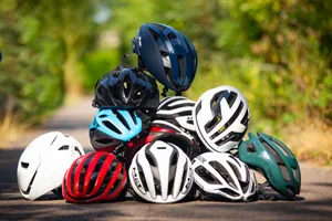 Image showing pile of helmets, best road bike helmets tested by BikeRadar, 1 Pile of road bike helmets.