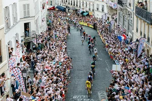 TOPSHOT-CYCLING-TDF-2026-STAGE 21 TOPSHOT - UAE Team Emirates - XRG's Slovenian rider Tadej Pogacar wearing the overall leader's yellow jersey leads the pack of riders (peloton) up Rue Lepic on the ascent of the Butte de Montmartre during the 21st stage of the 113th edition of the Tour de France cycling race, 88,7 km starting and finishing in Paris, on July 26, 2026. (Photo by GEOFFROY VAN DER HASSELT / AFP via Getty Images)