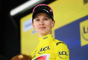 3rd Tour de France Femmes 2024 – Stage 6 MORTEAU, FRANCE - AUGUST 16: Katarzyna Niewiadoma of Poland and Team Canyon//SRAM Racing celebrates at podium as Yellow leader jersey winner during the 3rd Tour de France Femmes 2024, Stage 6 a 159.2km stage from Remiremont to Morteau / #UCIWWT / on August 16, 2024 in Morteau, France. (Photo by Alex Broadway/Getty Images)