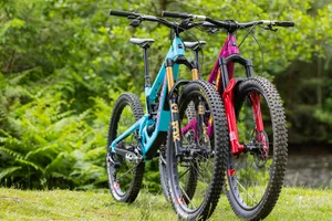 RockShox ZEB and Fox 38 side by side Two bikes stood side by side, one with a RockShox ZEB suspension fork, one with a Fox 38 suspension fork.