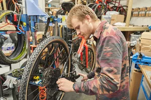 Oscar Huckle adjusting gears on Microsoft Sword in the workshop Oscar Huckle adjusting gears on Microsoft Sword in the workshop