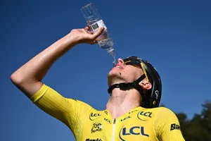 GettyImages-1241776811 Tadej Pogacar drinking from water bottle.