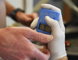 Lactate Study Colorado University BOULDER, CO - APRIL 19: Dr. Inigo San Millan takes a blood sample from triathlete Zach Barber with a lactate take meter during a metabolic and physiologic test in a lab at the University of Colorado Sports Medicine Performance Center April 19, 2017 in Boulder, Colorado. (Photo by Andy Cross/The Denver Post via Getty Images)