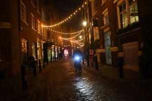 England Enters Tier System After Second Coronavirus Lockdown Ends- Tier Two LONDON, ENGLAND - DECEMBER 02: A man is seen cycling through an empty Covent Garden on December 2, 2020 in London, England.