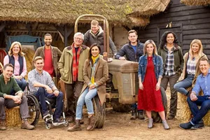 Countryfile presenters Countryfile presenters around a tractor
