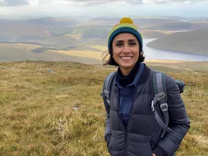 Anita Rani Ramble Anita Rani on the top of a hill during a walk