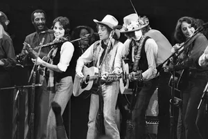 Joan Baez, Ramblin’ Jack Elliott, and Bob Dylan Performing Musicians (L-R)Richie Havens, Joan Baez, Ramblin' Jack Elliott, Bob Dylan and others perform at a benefit concert for Rubin "Hurricane" Carter.