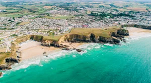 An aerial view of a sandy beach in Newquay, Cornwall An aerial view of Newquay beach