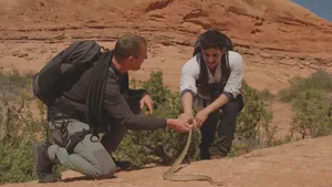 CITW_S1_Ep5_ParasPatel_FINAL_CLEAN_NOBARS.00_23_35_08.Still013 Bear Grylls and Paras Patel handling a snake together