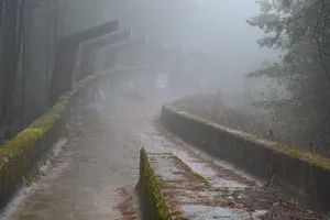 Abandoned Olympic Bobsled Run in Fog The war damaged bobsled run from the 1984 Winter Olympics sits abandoned in the mountains above Sarajevo.