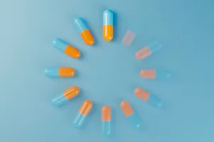 next-gen-weight-loss-drugs Digital loading symbol with medicine pills, flat lay. (3d render)