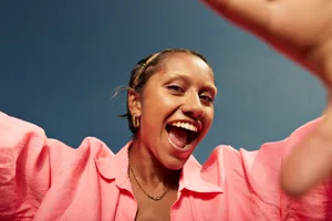 Cortisol Close-up of happy person wearing pink