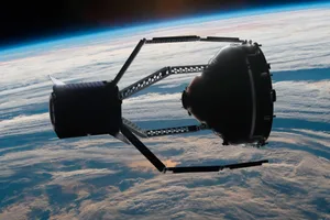 space-junk-robotic-tentacles Image of a vehicle in space using robotic tentacle arms to grab a piece of space junk