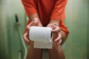 person on toilet