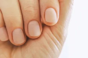 manicured hand Four clean fingernails