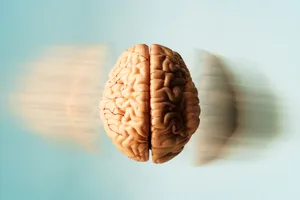 Human brain with motion blur effect symbolizing cognition, thinking, memory and mental processes Floating human brain with motion blur to suggest rapid thought