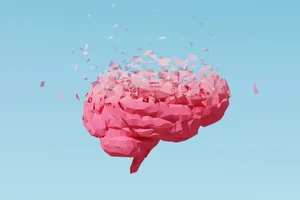 Brain memory loss concept A low-polygon human brain dissolves from top to bottom, visually representing the progression of memory loss.
