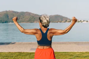 LimitOfAgeing Senior woman flexing arms