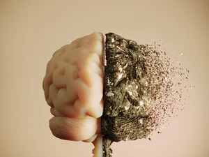Human brain with cognitive decline concept A 3D concept of a human brain where one side appears healthy and the other side disintegrates into fragments. Suitable for topics like Alzheimer’s, dementia, mental health, and neurological diseases. (3d render)