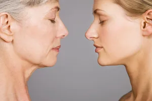 REverse ageing main Young and old woman looking at each other