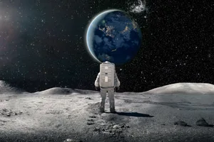 Astronaut An astronaut stands on the Moon looking at Earth