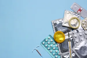 Birth control Different types of birth control on a blue background