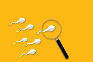 The change to your semen you should never ignore An illustration of sperm cells and a magnifying glass