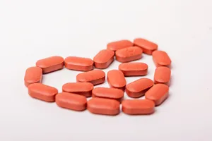 Iron Red iron tablets arranged in the shape of a heart