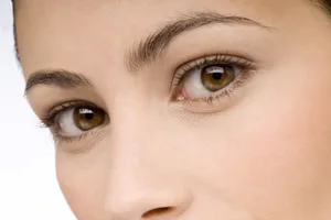 Eye problems you should never ignore An extreme close-up of a woman with brown eyes, who is looking into the camera