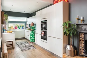 The previous owners had installed a simple white-gloss kitchen that included integrated appliances and high-quality quartz work surfaces. As well as tiling and painting the walls, Sophie and Rich added open shelves to boost storage and display treasures The previous owners had installed a simple white-gloss kitchen that
included integrated appliances and high-quality quartz work surfaces.
As well as tiling and painting the walls, Sophie and Rich added open
shelves to boost storage and display treasures