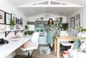 White could be a little cold as a backdrop in an office shed, but Lisa warmed the room up with soft wooden-effect flooring and lots of throws, sheepskin rugs and accessories with hints of pink, copper and green White could be a little cold as a backdrop in an office shed, but Lisa warmed the room up with soft wooden-effect flooring and lots of throws, sheepskin rugs and accessories with hints of pink, copper and green