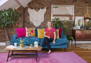 Emma made the macramé hanging, and found the brass lamp on the street. It doesn’t work, but she loves the look of it. The rug, from Rug Vista, is the same pink as her wedding shoes; one of the many personal touches she’s added Living room makeover: 'My multi-use room sings with colour'
