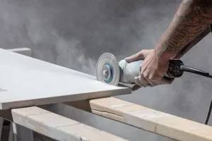 Quartz worktop story A worktop being cut by a tradesperson