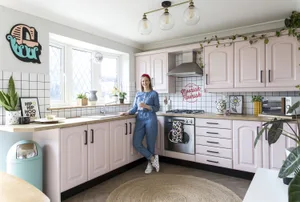A once old-fashioned kitchen is now a bright, on-trend and welcoming space thanks to the newly painted cupboards, fresh flooring and quirky details Kitchen makeover: 'We gave our kitchen a retro revamp for under £900'