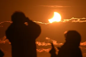Partial solar eclipse. Photo by SANKA VIDANAGAMA/AFP via Getty Images Partial solar eclipse. Photo by SANKA VIDANAGAMA/AFP via Getty Images