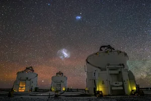 The Large and Small Magellanic Clouds appear over the Very Large Telescope in the night sky above Chile. Credit: J. C. Muñoz/ESO The Large and Small Magellanic Clouds appear over the Very Large Telescope in the night sky above Chile. Credit: J. C. Muñoz/ESO