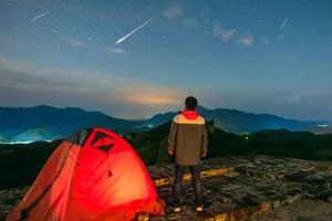 Person watching meteor shower. Credit: bjdlzx / Getty Images Person watching meteor shower. Credit: bjdlzx / Getty Images