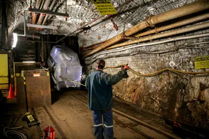 LZ’s central detector was assembled in a cleanroom on the surface, then moved a mile underground at the Sanford Underground Research Facility. The underground location shields the experiment from cosmic rays. Credit: Matthew Kapust/Sanford Underground Research Facility LZ’s central detector was assembled in a cleanroom on the surface, then moved a mile underground at the Sanford Underground Research Facility. The underground location shields the experiment from cosmic rays. Credit: Matthew Kapust/Sanford Underground Research Facility