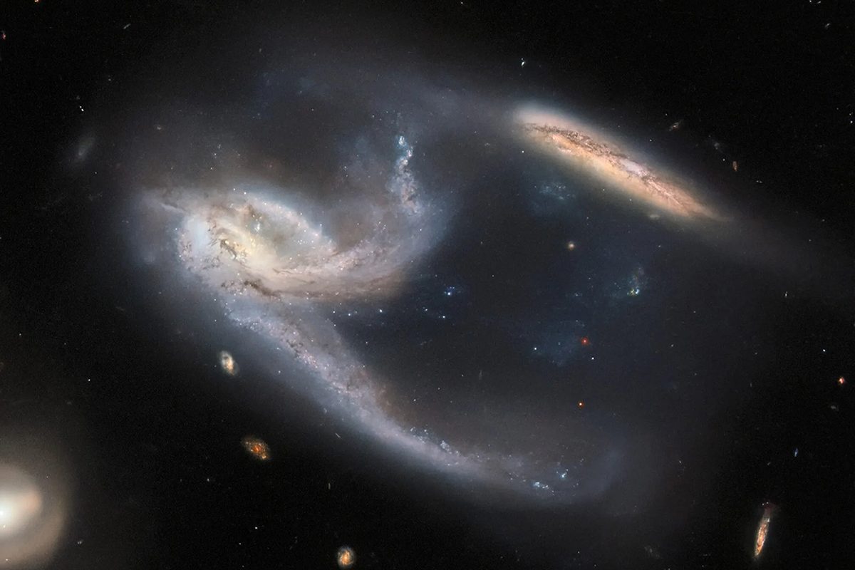 Galaxy triplet NGC 7764A in the constellation Phoenix, captured by the Hubble Space Telescope Credit: ESA/Hubble & NASA