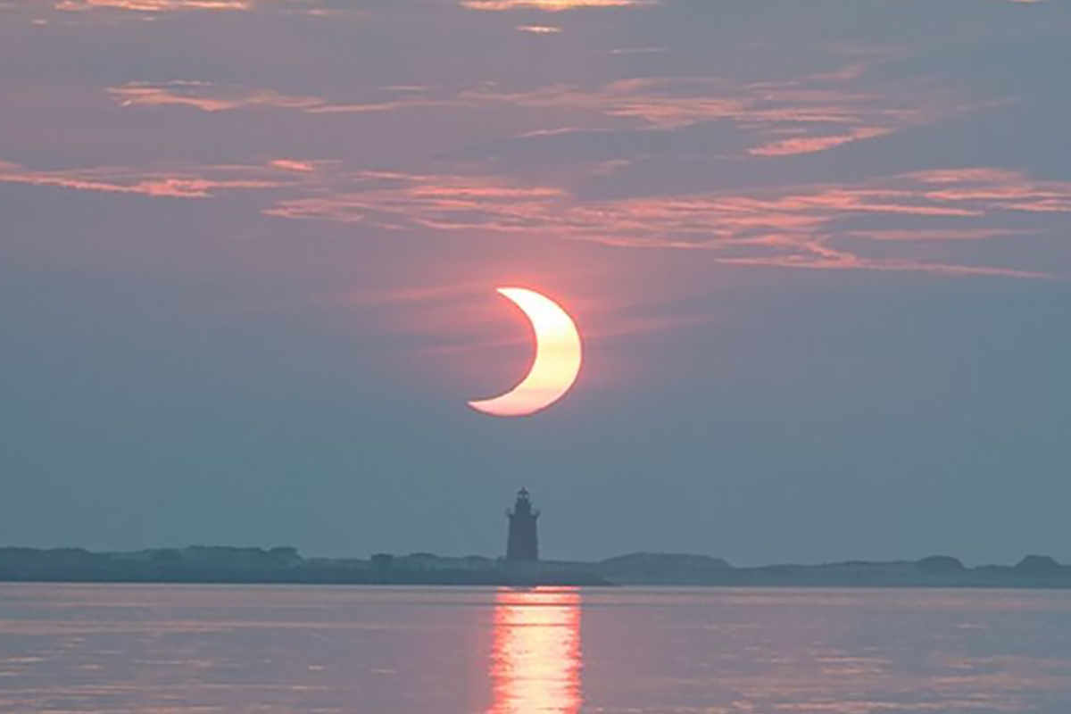 Diagram showing a sunset solar eclipse over the Mediterranean Sea