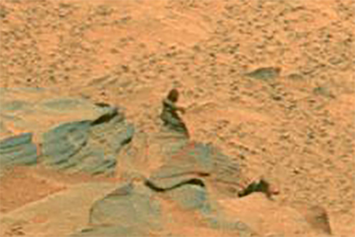 This creepy 'statue' that looks like a robed figure on Mars gives us the chills. Here's what's really going on