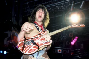 Eddie Van Halen 1984 Eddie Van Halen of the Van Halen, playing his custom Kramer Frankenstrat guitar during Van Halen's "1984 Tour" on April 5, 1984