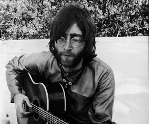 Beatles Sexy Sadie John LENNON playing the guitar in Rishikesh, India where he was following a transcendental meditation course with the rest of the BEATLES members, 1968