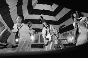 Rolling-Stones-1974-It’s-Only-Rock-n-Roll The Rolling Stones pose during the production of their music video for 'It's Only Rock 'n Roll (But I Like It)', June 1974