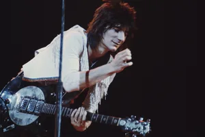 Ronnie Wood 1975 Rolling Stones guitarist Ronnie Wood performing on stage, circa 1975